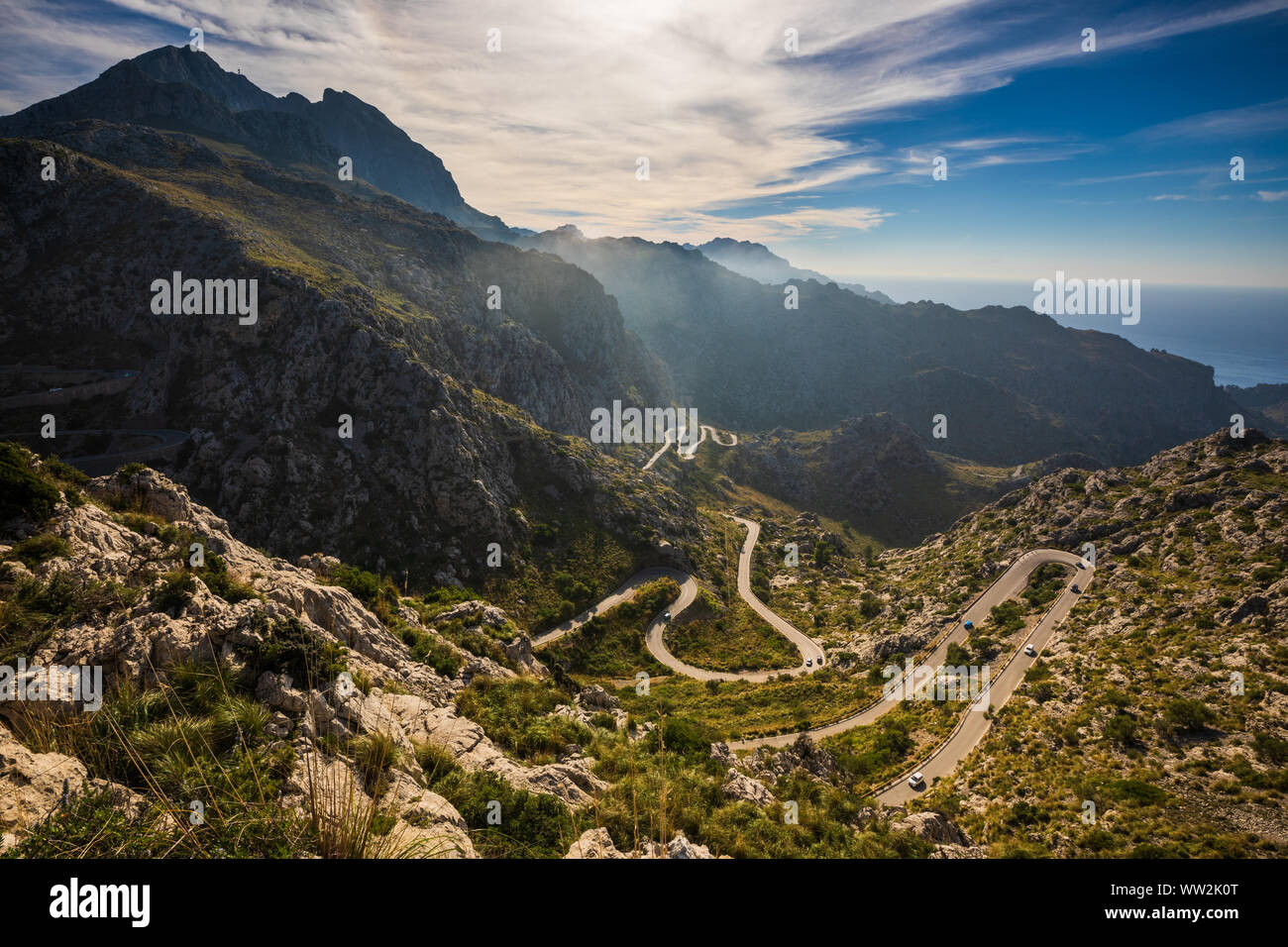 Wide view of Coll dels Reis road with mountains, Mallorca Stock Photo