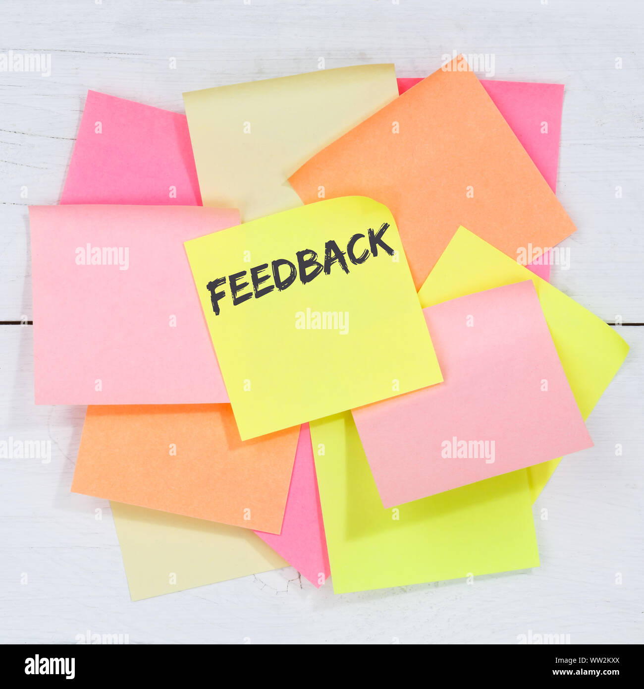 Feedback contact customer service opinion survey review business concept desk note paper notepaper Stock Photo