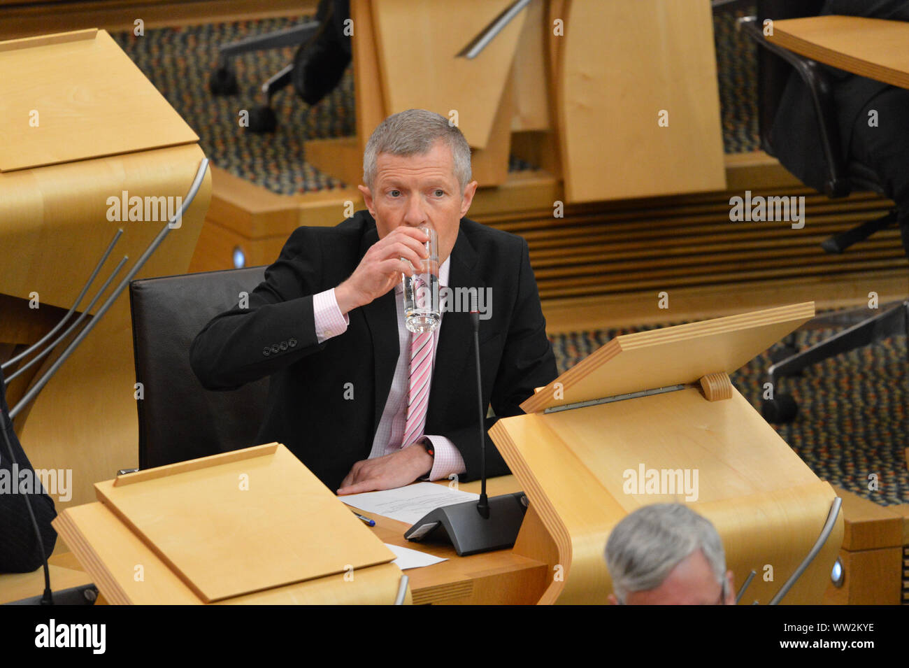 Edinburgh, UK. 12th Sep, 2019. Pictured: Willie Rennie MSP - Leader of the Scottish Liberal Democrat Party. Weekly session of First Ministers Questions as the Scottish Parliament tries to steer a path through the fallout of the latest Brexit mess and prevent Scotland from leaving the EU. Credit: Colin Fisher/Alamy Live News Stock Photo