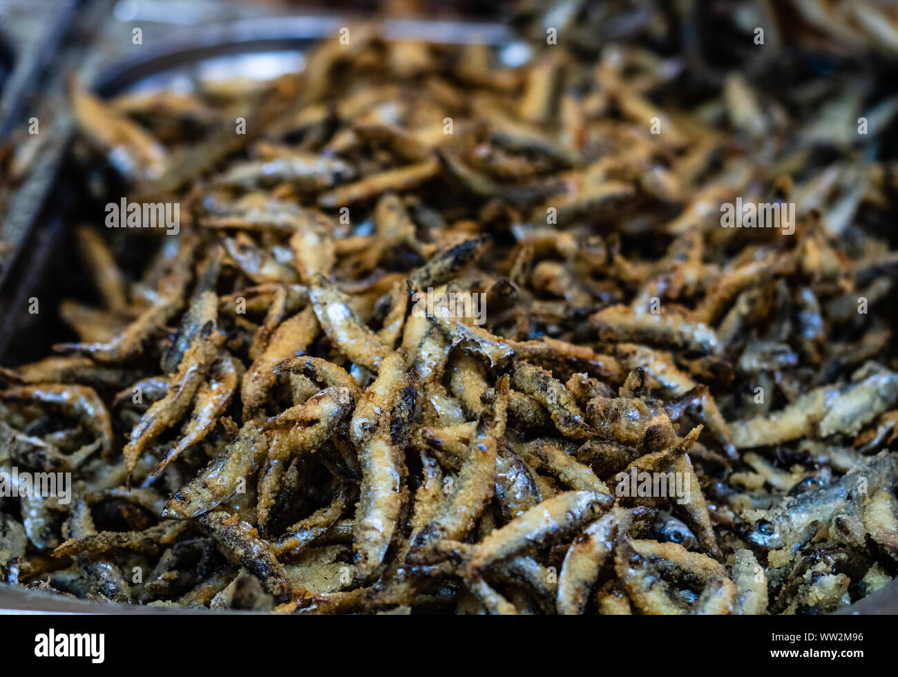 Fried little fish in market or food festival, food truck, food market