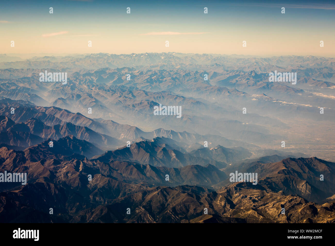 Wide aerial view of Alps in the morning, beginning of autumn Stock Photo