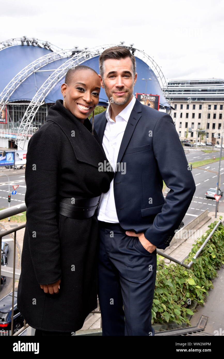 Cologne, Germany. 12th Sep, 2019. The actor Jo Weil and the singer Aisata Blackman install a love castle on the Hohenzollern Bridge in Cologne. Both play the leading role in the musical Bodyguard, which will also be guest in the musical Dome Köln from 23.10.2019. Credit: Horst Galuschka/dpa/Horst Galuschka dpa/Alamy Live News Stock Photo