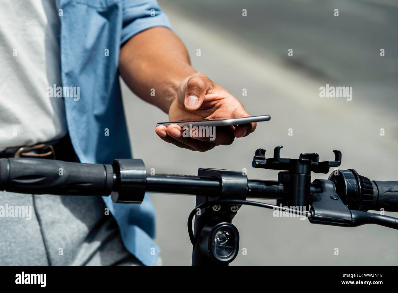 Young man using smart phone Stock Photo