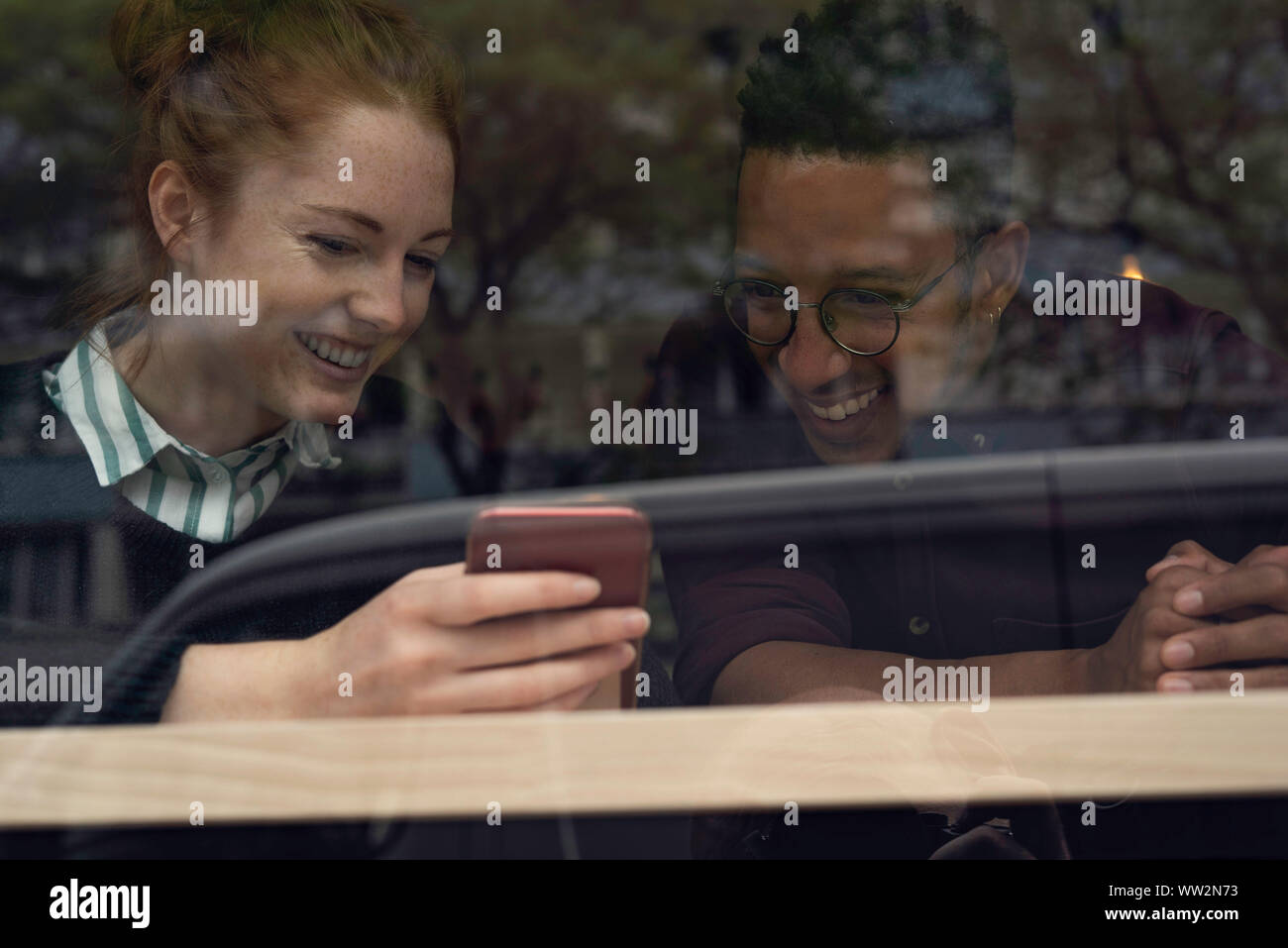 Couple using smart phone Stock Photo