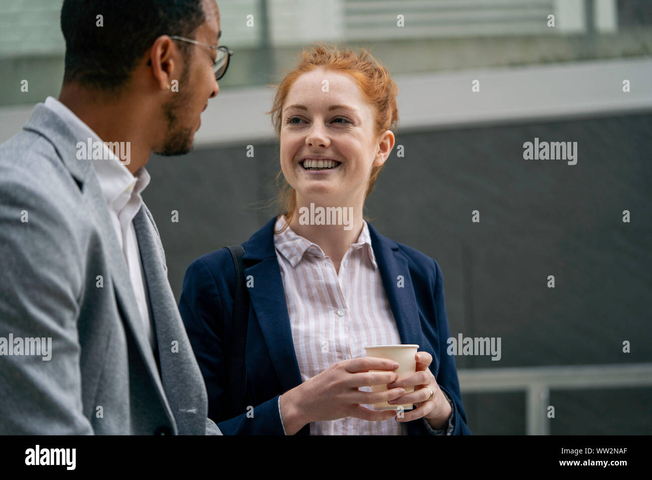Couple talking outdoors Stock Photo