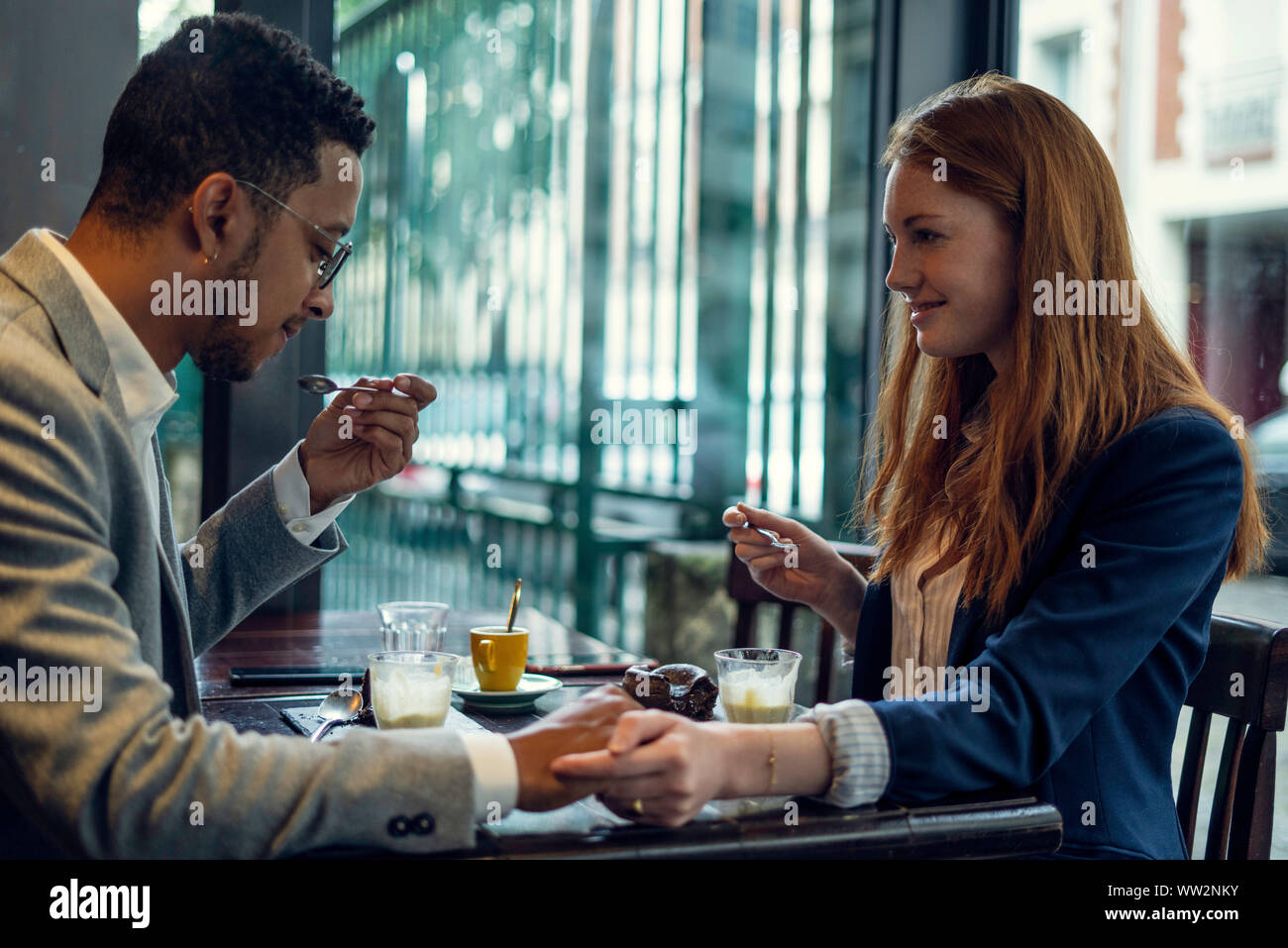 Man, happy, eating with spoon hi-res stock photography and images - Alamy