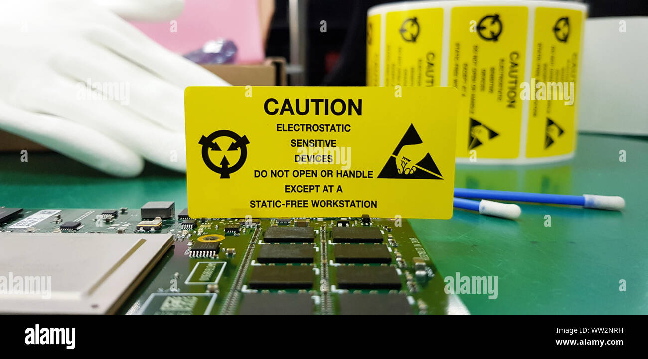 The yellow CAUTION label for Electrostatic Sensitive Devices (ESD) on