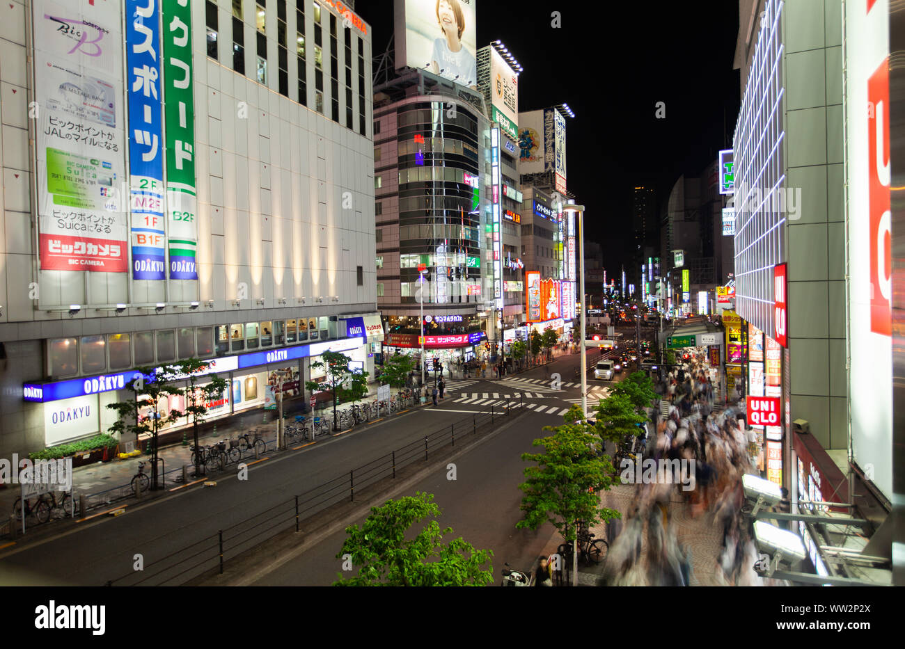 Crowd of people crossing street Stock Photo