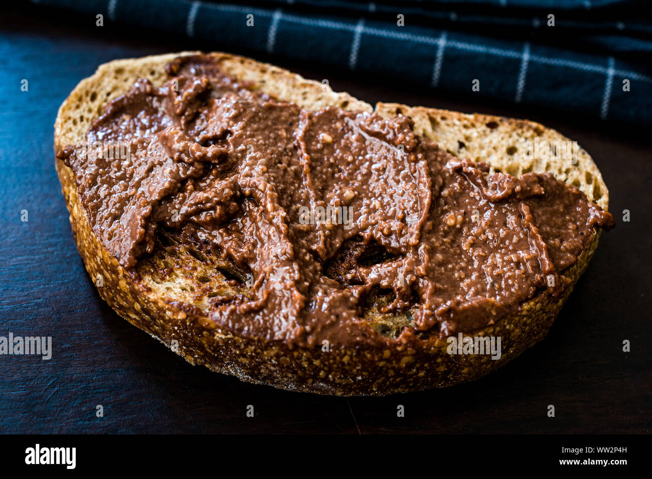 Homemade Cream Chocolate Hazelnut Spread with Bread Slice. Organic Food. Stock Photo