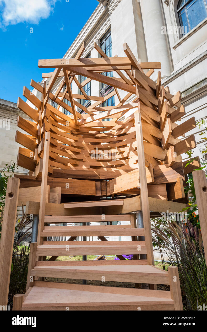 London, UK. 12th Sep 2019. Sir John Sorrell CBE, Chairman of London Design Festival, commissioned Juliet Quintero of Dallas-Pierce-Quintero, to create a lookout seat for the garden. It is shaped like a bird’s nest and will create a space for contemplation and reflection.  The planks of red oak were thermally modified to make the piece more durable for outdoor use and the piece was structurally engineered by Arup. Credit: Guy Bell/Alamy Live News Stock Photo