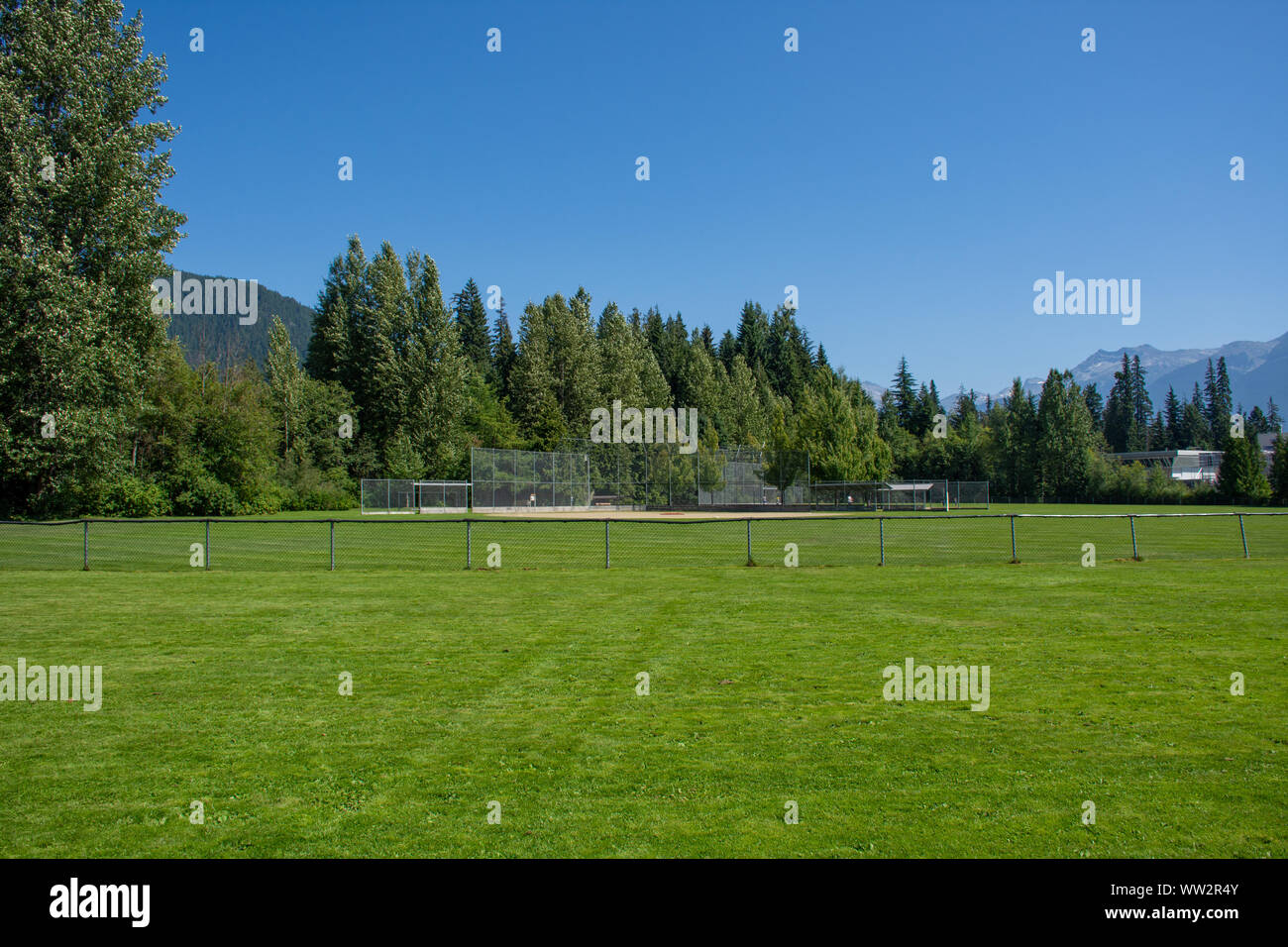 Empty baseball or softball diamond from the back fence and foul line