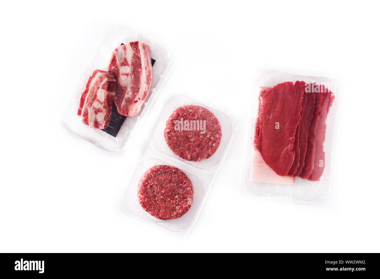 Different types of meat packaged in plastic isolated on white