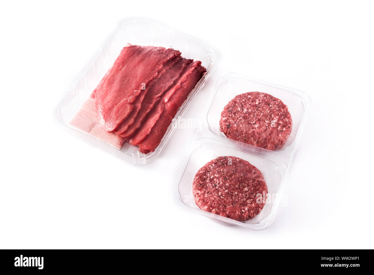 Different types of meat packaged in plastic isolated on white