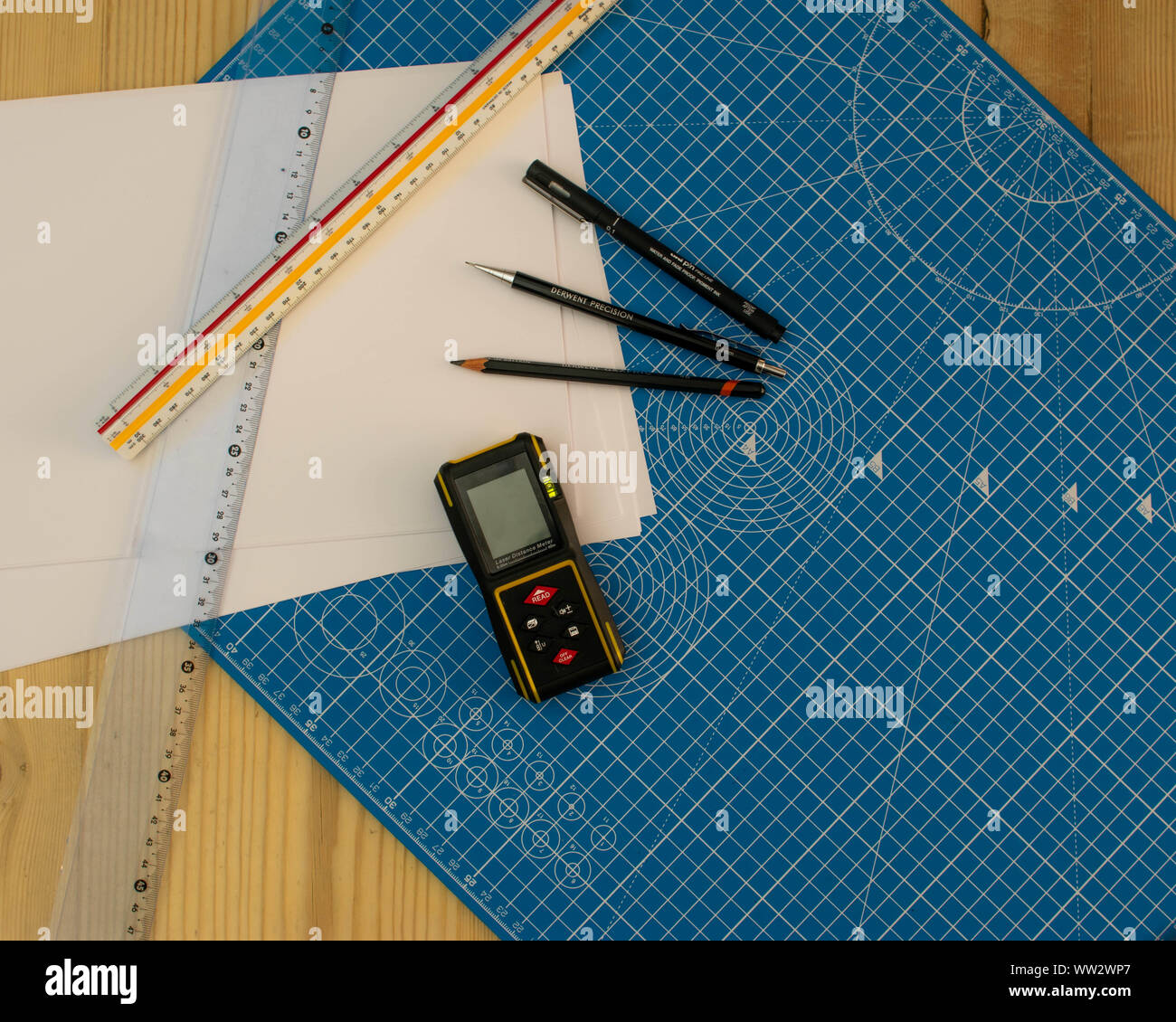 Technical drawing design work space in close up flat lay image Stock Photo