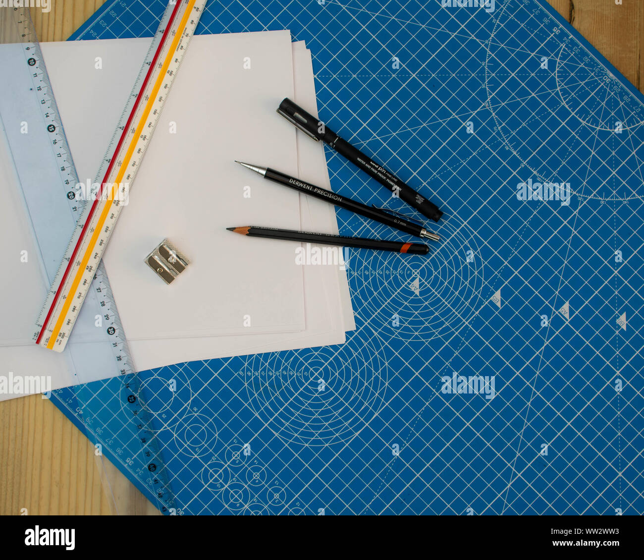 Technical drawing design work space in close up flat lay image Stock Photo