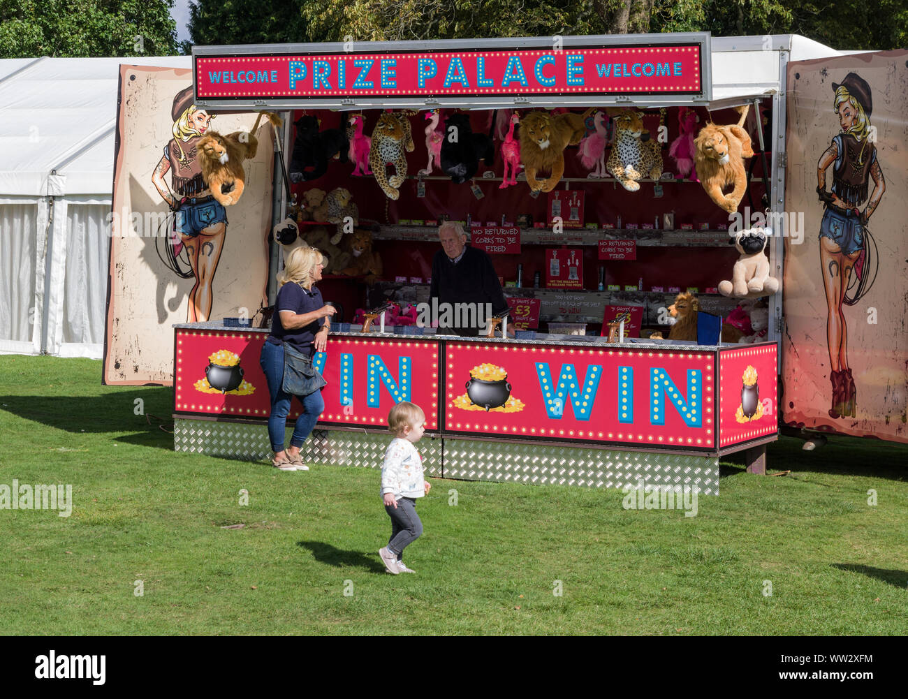 Fairground stall, featuring pistol shooting to win prizes, Delapre Abbey, Northampton, UK Stock Photo