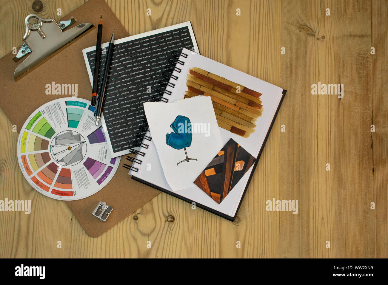 Flat lay of Interior designer work space with sketches, tools and colour chart Stock Photo