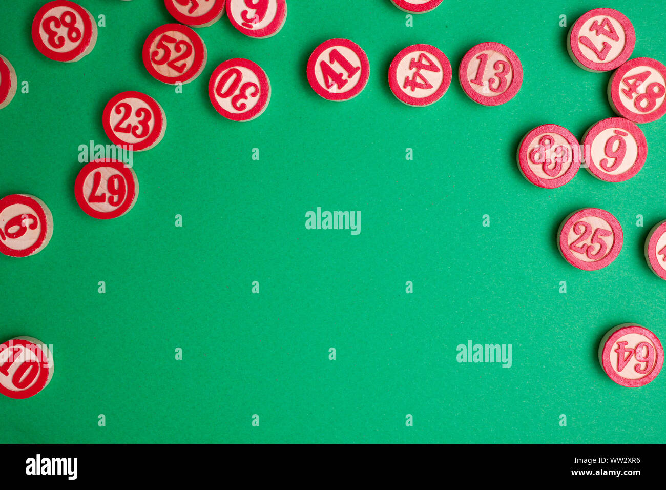 bingo numbers on green background - flat lay style Stock Photo