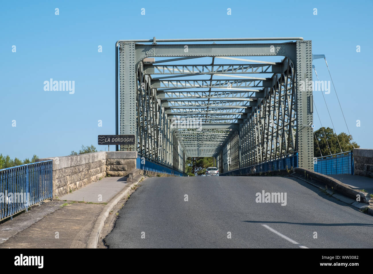Steel box truss bridge over the Dordogne river in Branne, Gironde, France Stock Photo