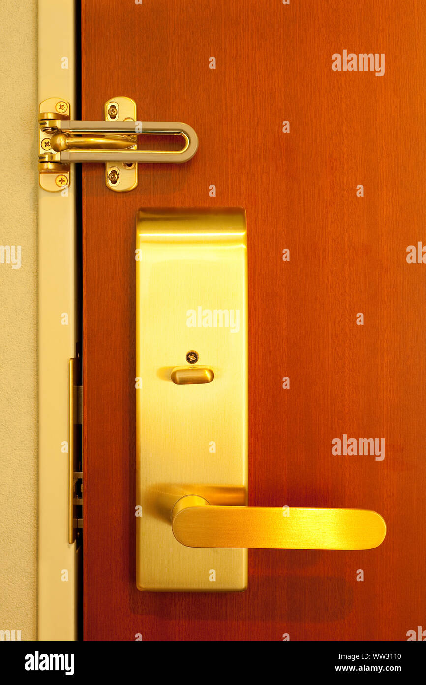 Hotel room doorknob with lock Stock Photo