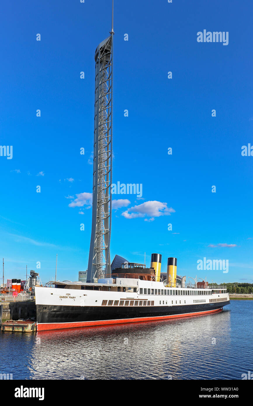 Tss (Turbine Steam Ship) Queen Mary berthed on the River Clyde at the Science Museum and the Observation tower, Glasgow, Scotland,UK. Stock Photo