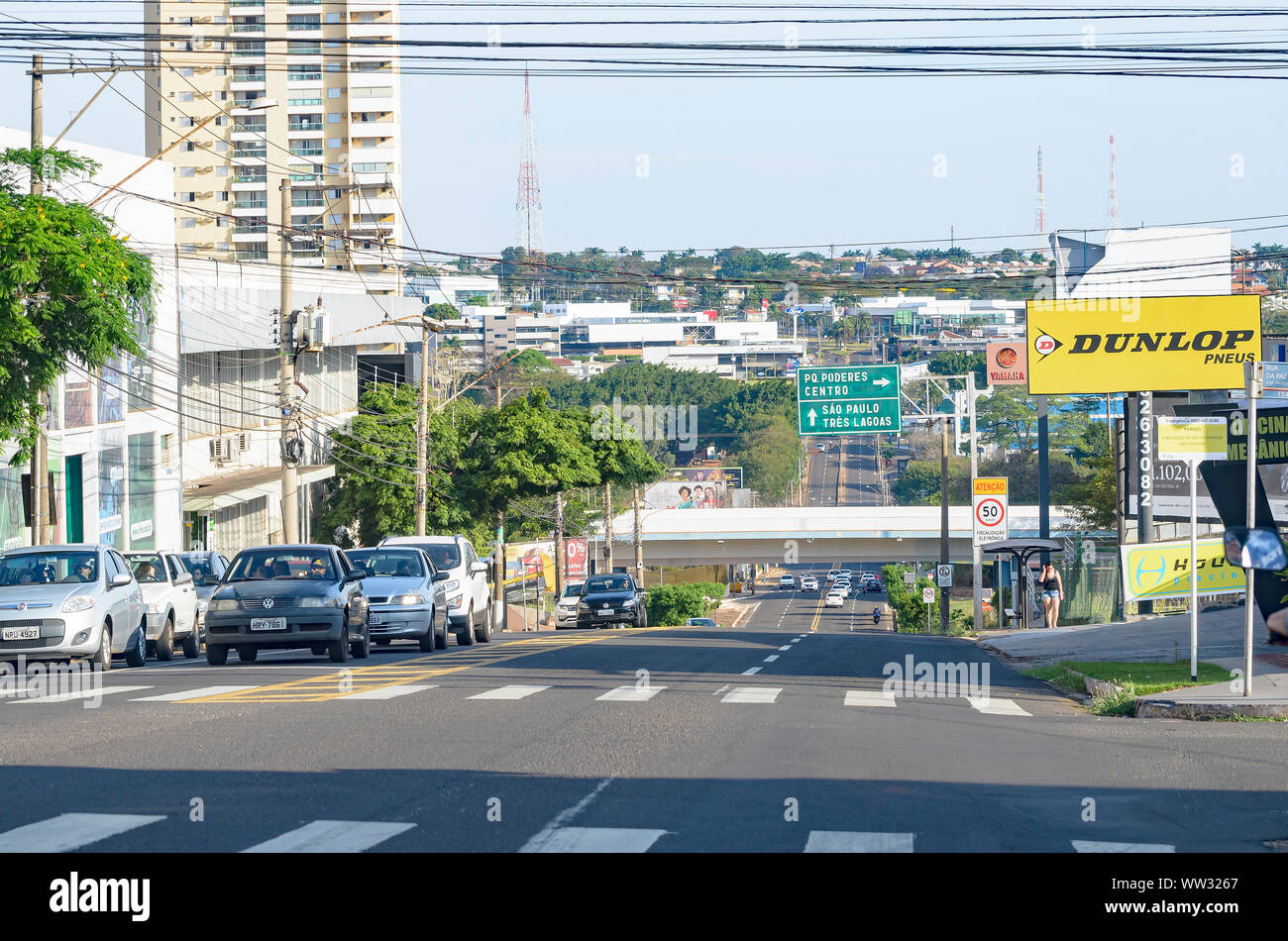Campo Grande - MS, Brazil - September 08, 2019: Transit on the avenue and the local commerce around at Ceara avenue. One of the main streets of the ci Stock Photo