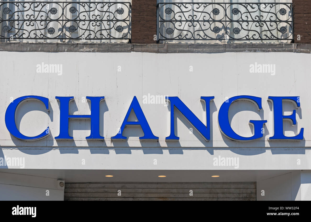 Big Blue Letters Change Sign at Building Stock Photo