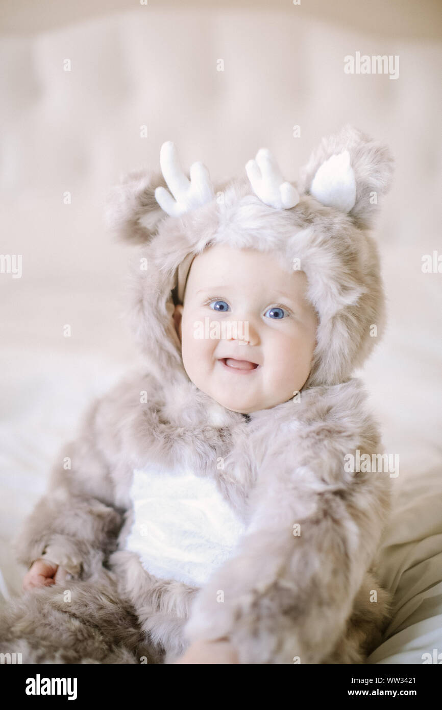 Baby in Deer Halloween Costume in White Background Stock Photo