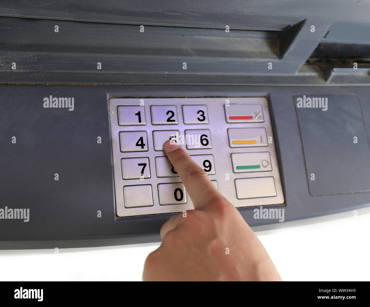keyboard and the hand insert the secret code on the terminal ATM Stock ...