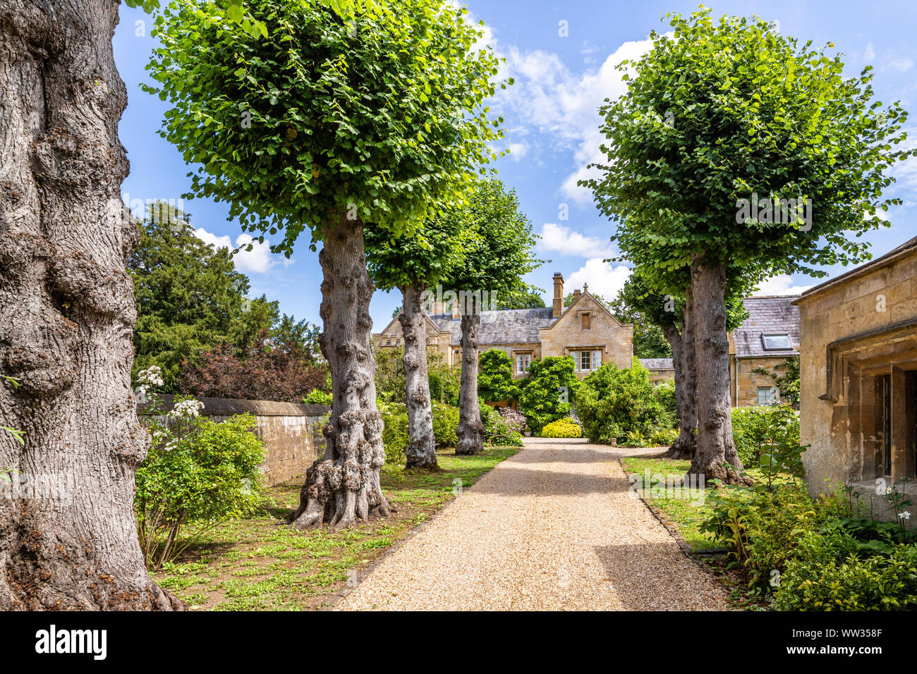 The entrance drive to Stanton Court in the Cotswold village of Stanton, Gloucestershire UK Stock Photo