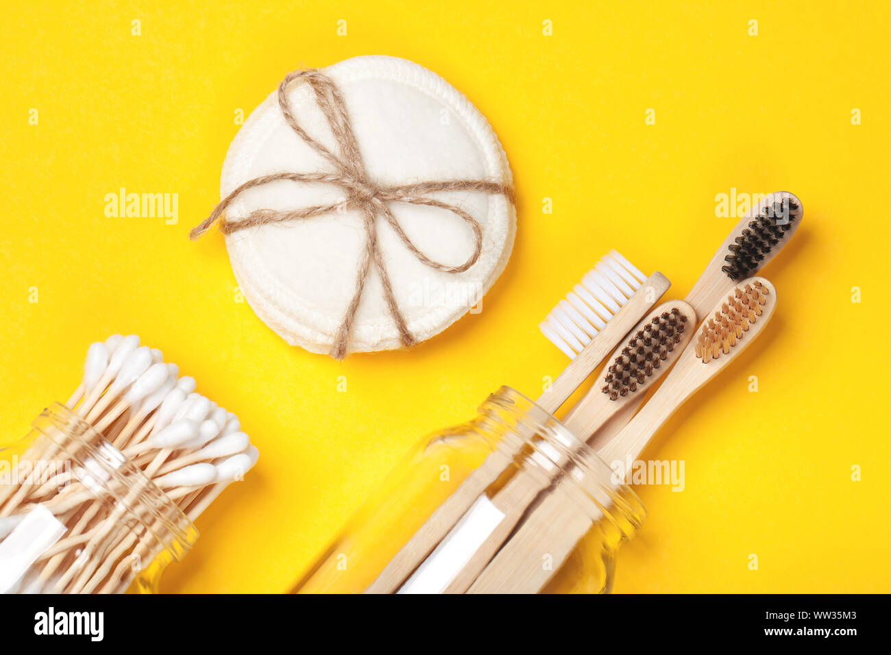 Set of eco-friendly plastic-free body care items on the yellow ...