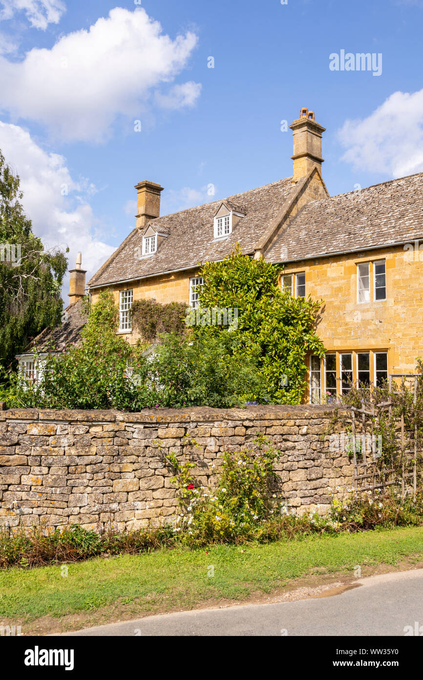 Cotswold stone houses in the village of Wood Stanway, Gloucestershire UK Stock Photo