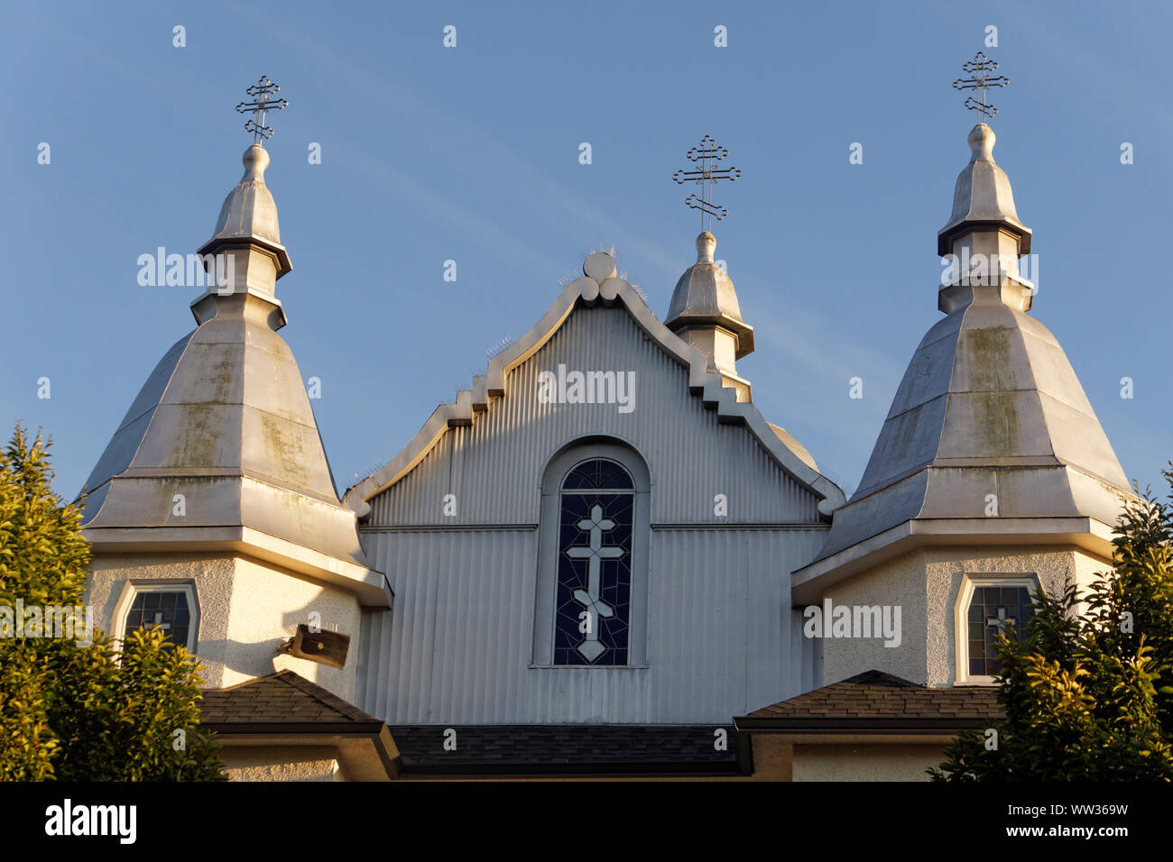 Holy Trinity Ukrainian Orthodox Cathedral facade spires with Russian Orthodox Crosses, Mount Pleasant, Vancouver, British Columbia, Canada Stock Photo