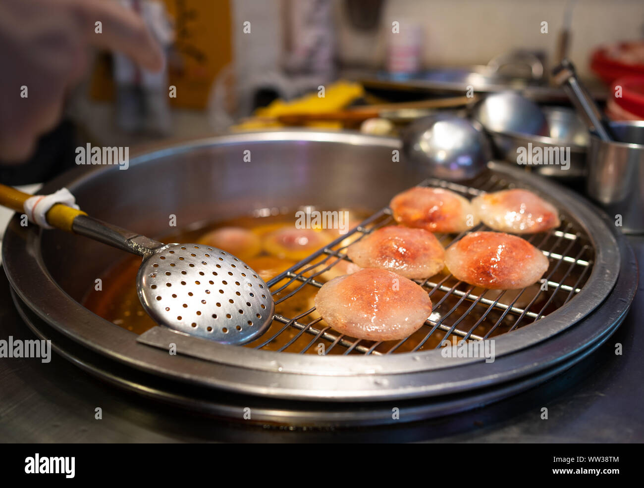 Taipei, Taiwan: Taiwanese traditional Meat Rolls called Ba-Wan or Rou-Yuan are resting after deep frying. Its a popular snack in Jiufen Stock Photo