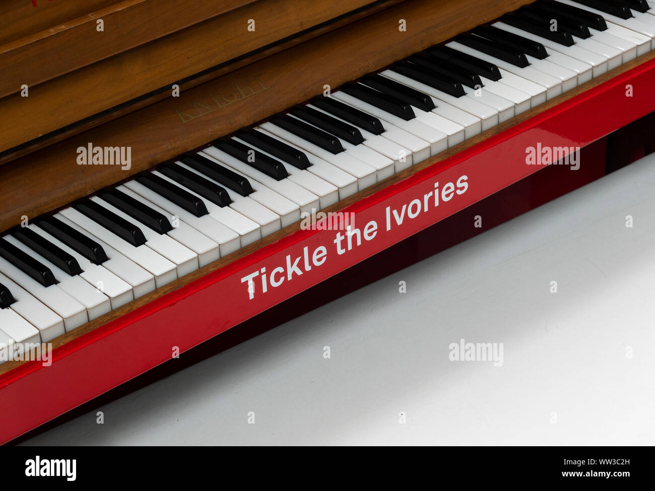 Tickle the ivories on a piano in Liverpool One, inviting anyone to play Stock Photo