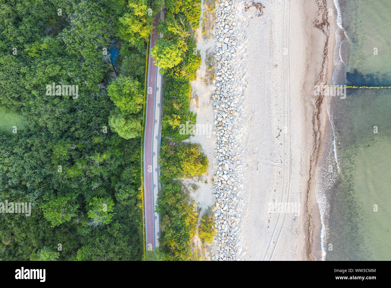 bicycle path between the sea and mangroves - top view Stock Photo