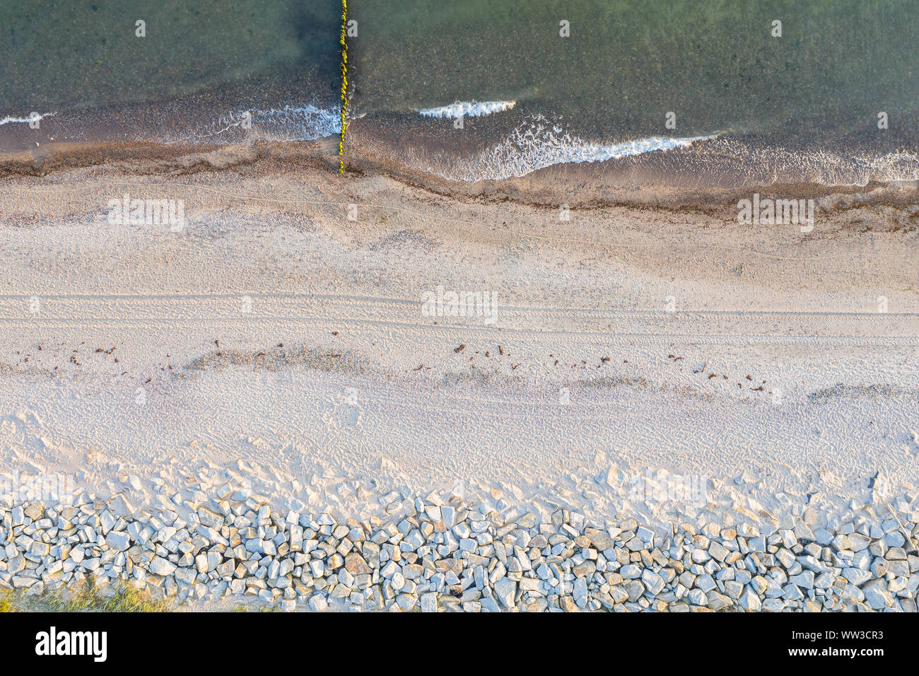 vehicle track on the beach seen from above Stock Photo