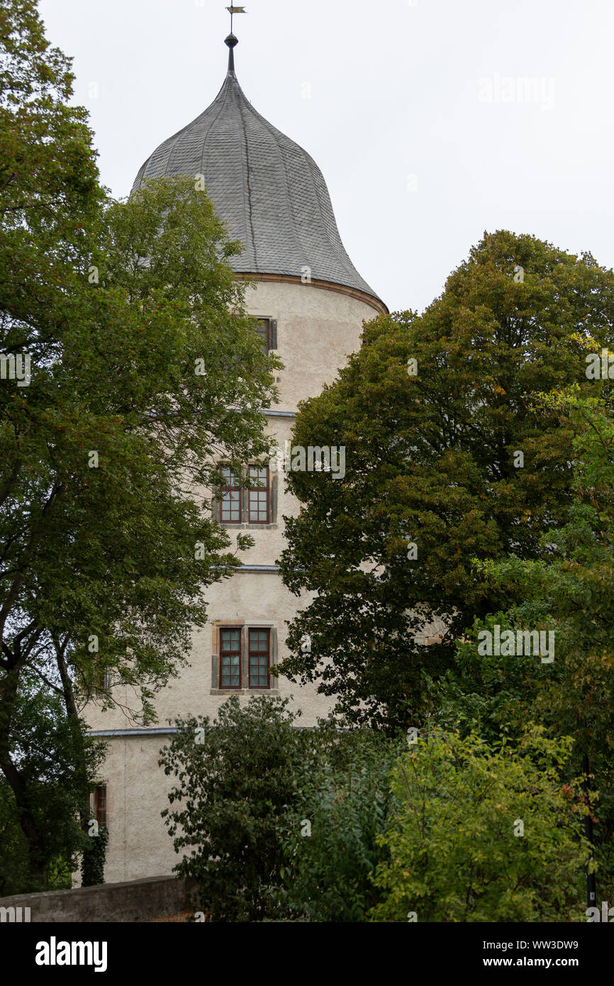 Tower of the Wewelsburg castle seen through the trees Stock Photo