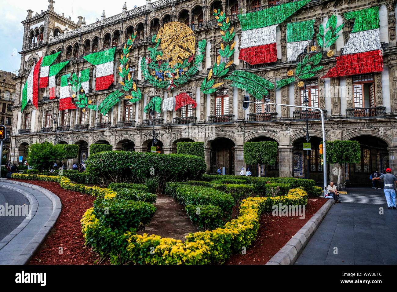 decoration of the Mexican national holidays. Mexican flag. patriotic month  or september patriotic month. Day of the cry of independence in the  government palace in the zocalo of Mexico City. Historic, architectural