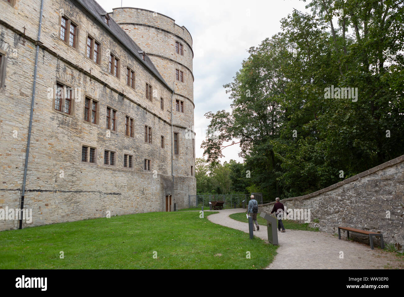 Walking path leading to the entrance of the great round tower of the Wewelsburg castle Stock Photo
