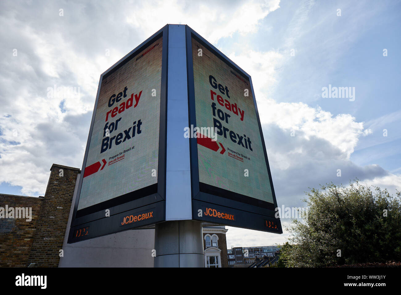 London, U.K. - September 10, 2019: An illuminated double-sided advert at Holland Park roundabout as part of the new government campaign calling for people to prepare for Brexit. Stock Photo