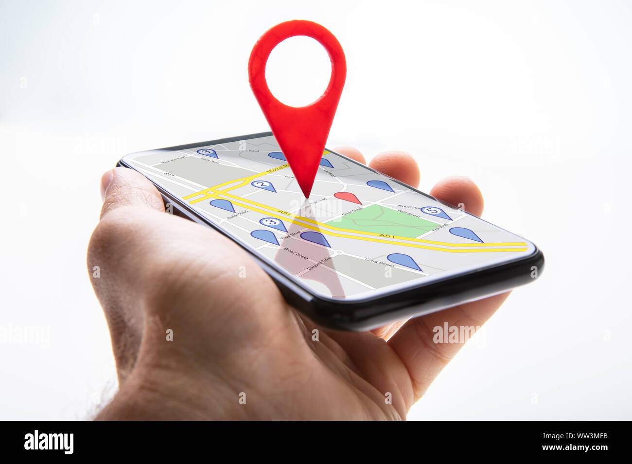 Close-up Of A Person's Hand Holding Cellphone With Red Map Pin Pointer ...