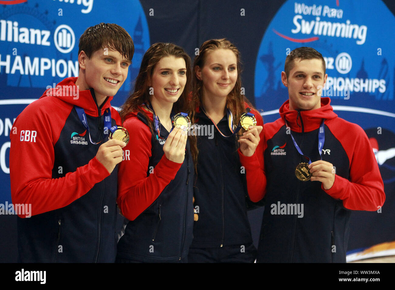 London, UK. 12th Sep, 2019. Great Britain's 4x100m Mixed relay S14 Team Thomas Hamer (1L), Jessica Jane Applegate (2L), Reece Dunn (2R) and Bethany Firth (1R) pose with their gold medals. World Para Swimming Allianz Championships 2019 day 4 at the London Aquatics Centre in London, UK on Thursday 12th September 2019. this image may only be used for Editorial purposes. Editorial use only, pic by Steffan Bowen/Andrew Orchard sports photography/Alamy Live news Credit: Andrew Orchard sports photography/Alamy Live News Stock Photo