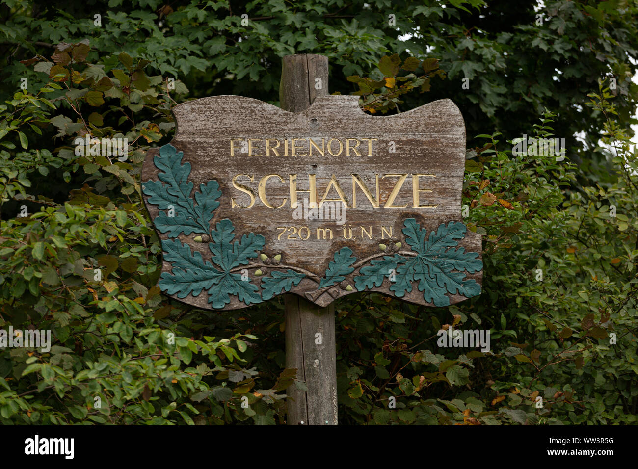 Winter sport area wooden sign of the village and ski resort of Schanze in the German Sauerland region Stock Photo