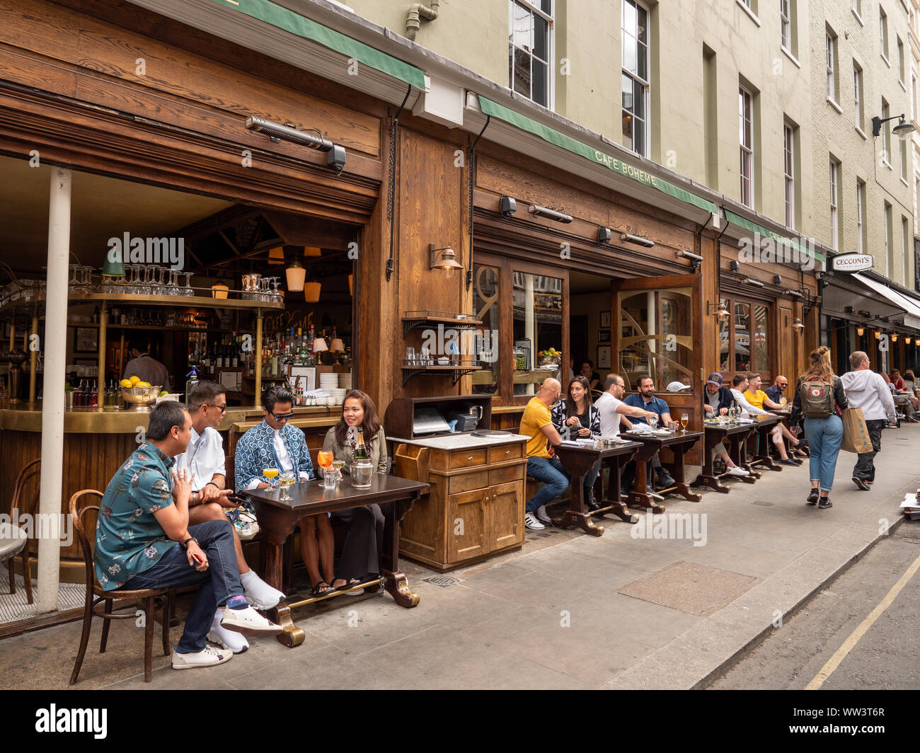 Pavement tables outside Cafe Boheme, Old Compton Street, London, UK Stock Photo