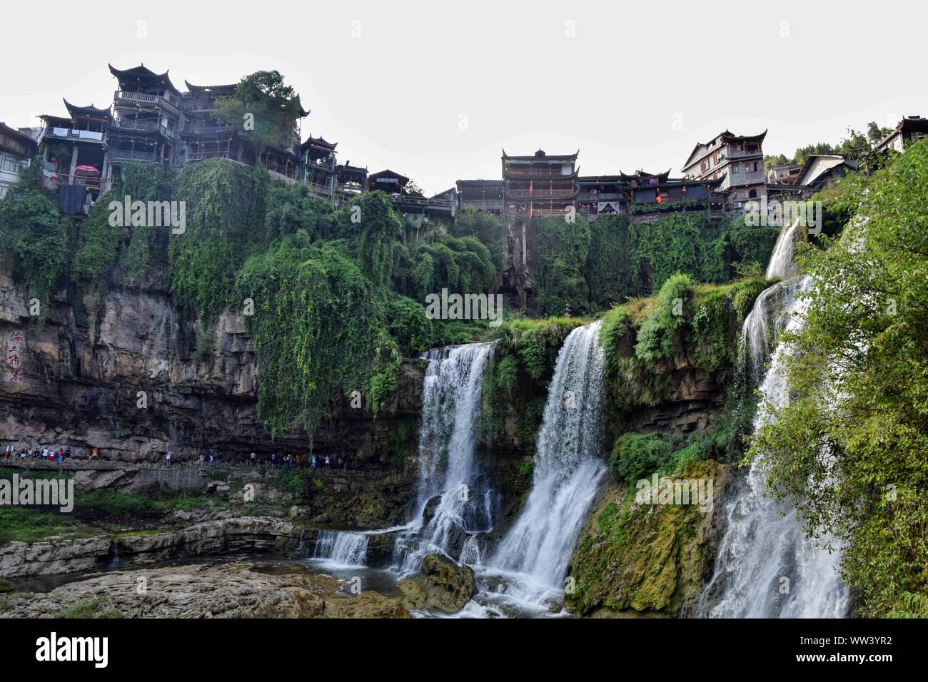 Picturesque ancient town in Hunan province in China - Hibiscus town and its  spectacular Furong Waterfall. Stock Photo