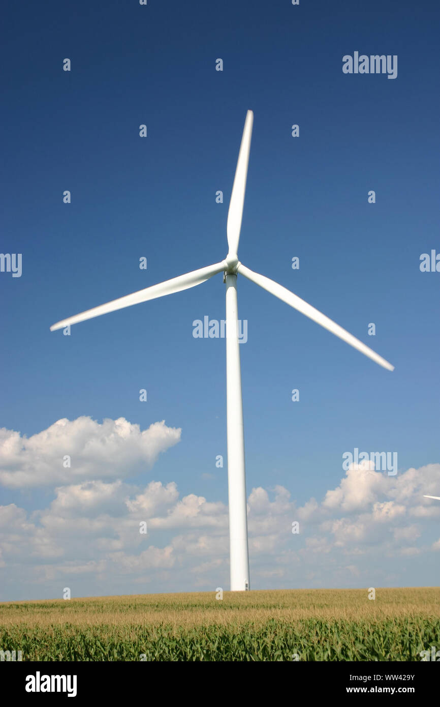 A wind turbine turns on a Minnesota summer day. Stock Photo