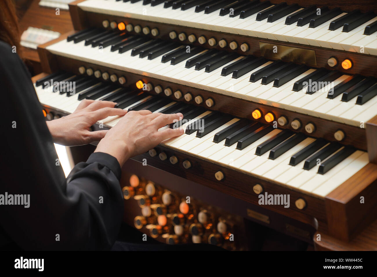Electronic organ player Stock Photo