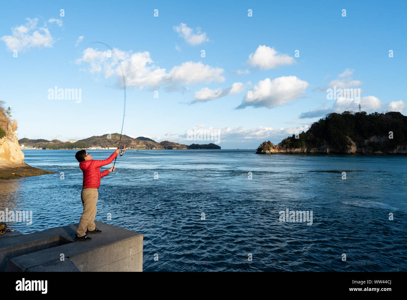 One boy fishing sea hi-res stock photography and images - Alamy