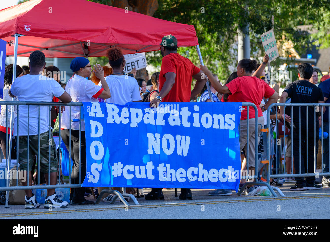 Houston, Texas - September 12, 2019: Small, vocal group of ADOS activists demand reparations for slavery outside Democratic primary debate venue near Stock Photo